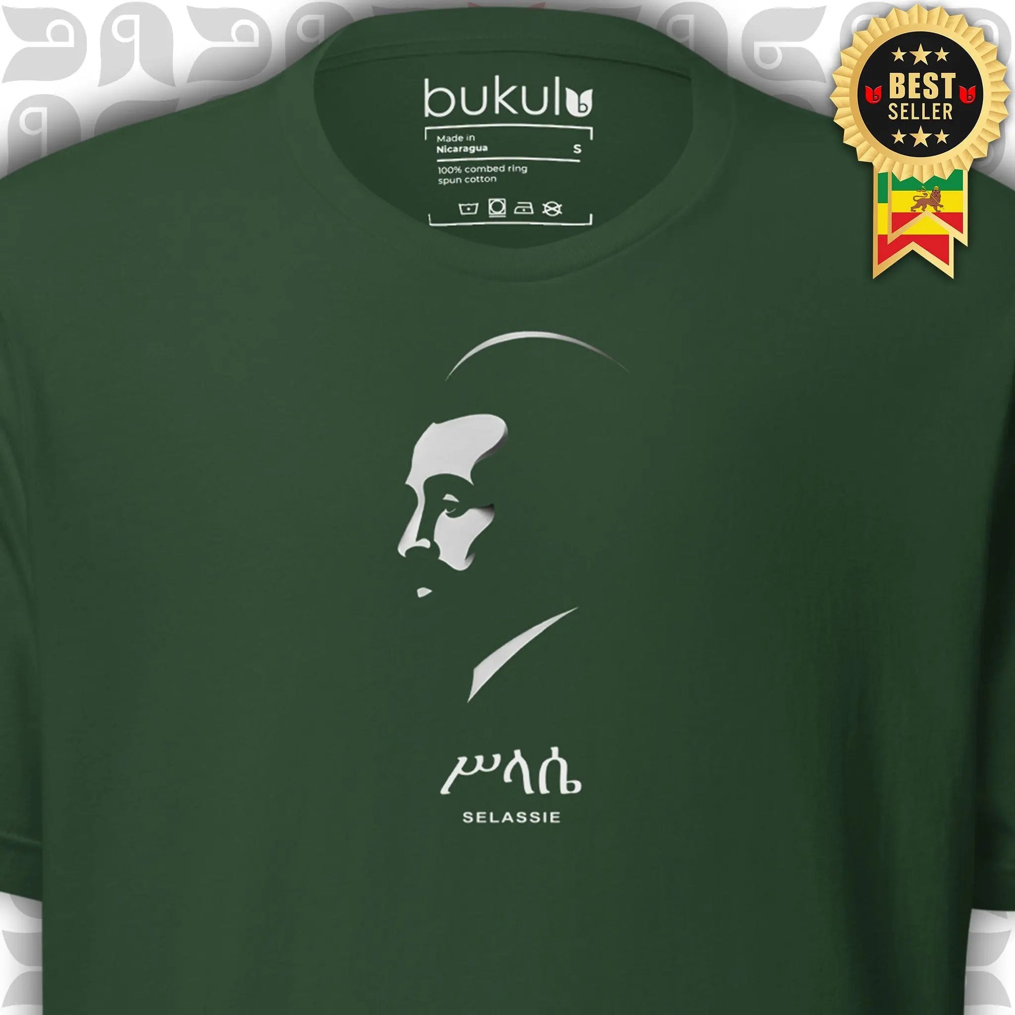 Green t-shirt with a white silhouette of Haile Selassie I and 'Selassie' text