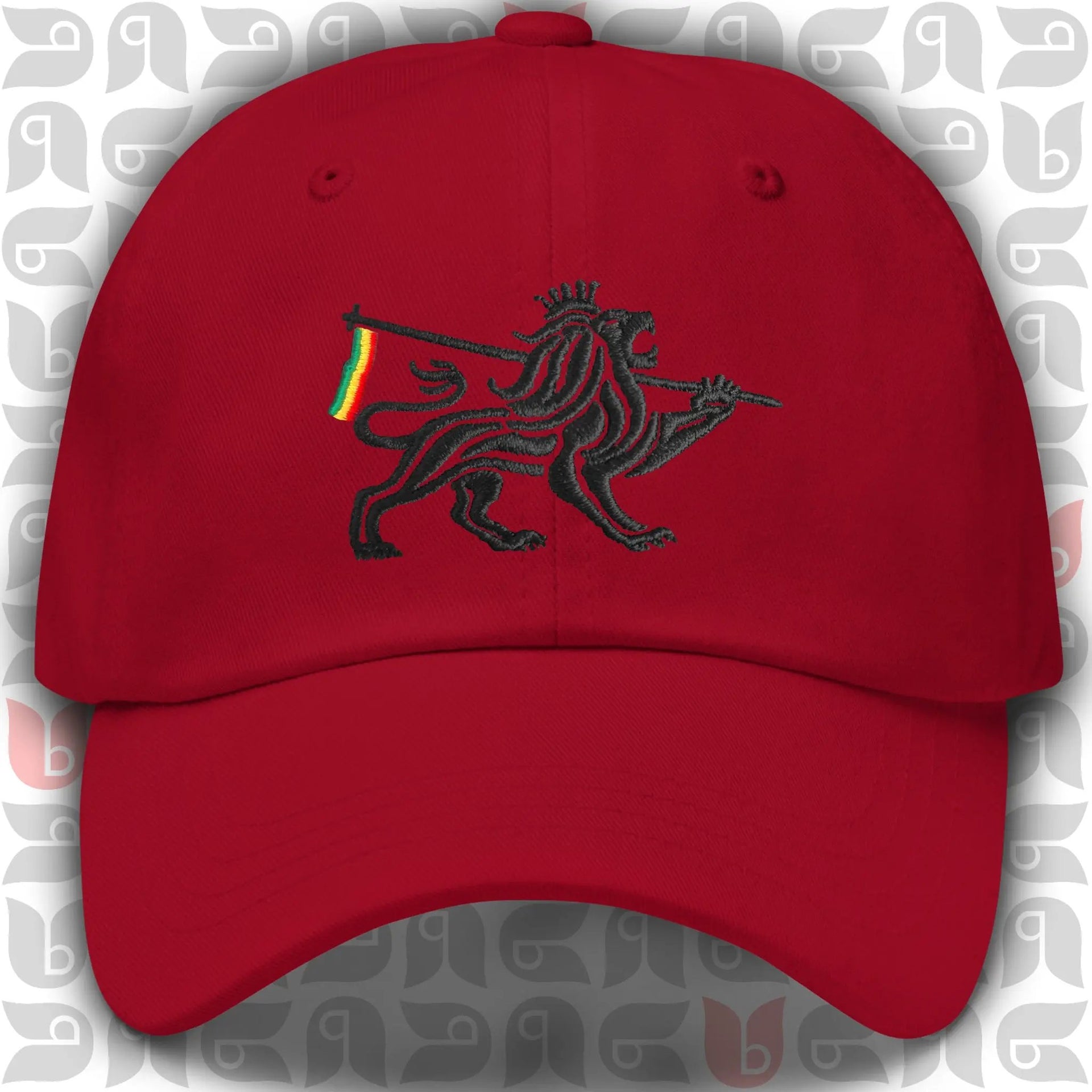 Red Rasta inspired dad hat with black Lion of Judah embroidery