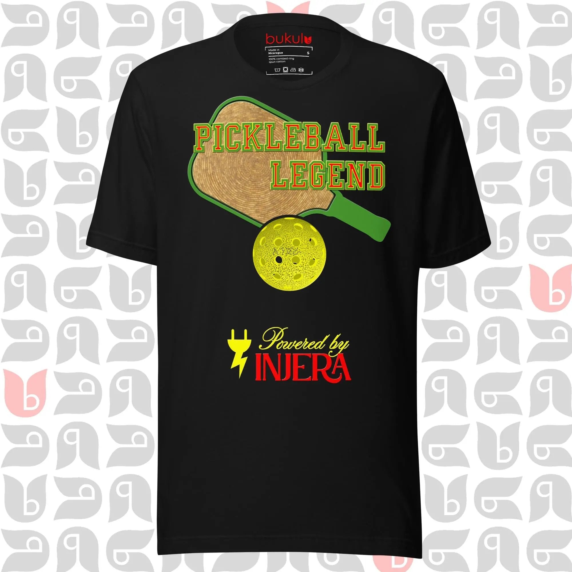 Ethiopian pickleball shirt showing sefed paddle and injera ball
